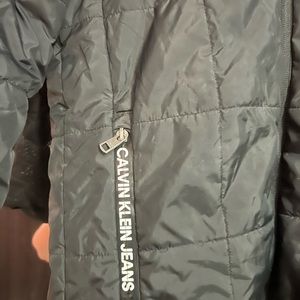 Boys black Calvin Klein winter coat. Size large (14/16).